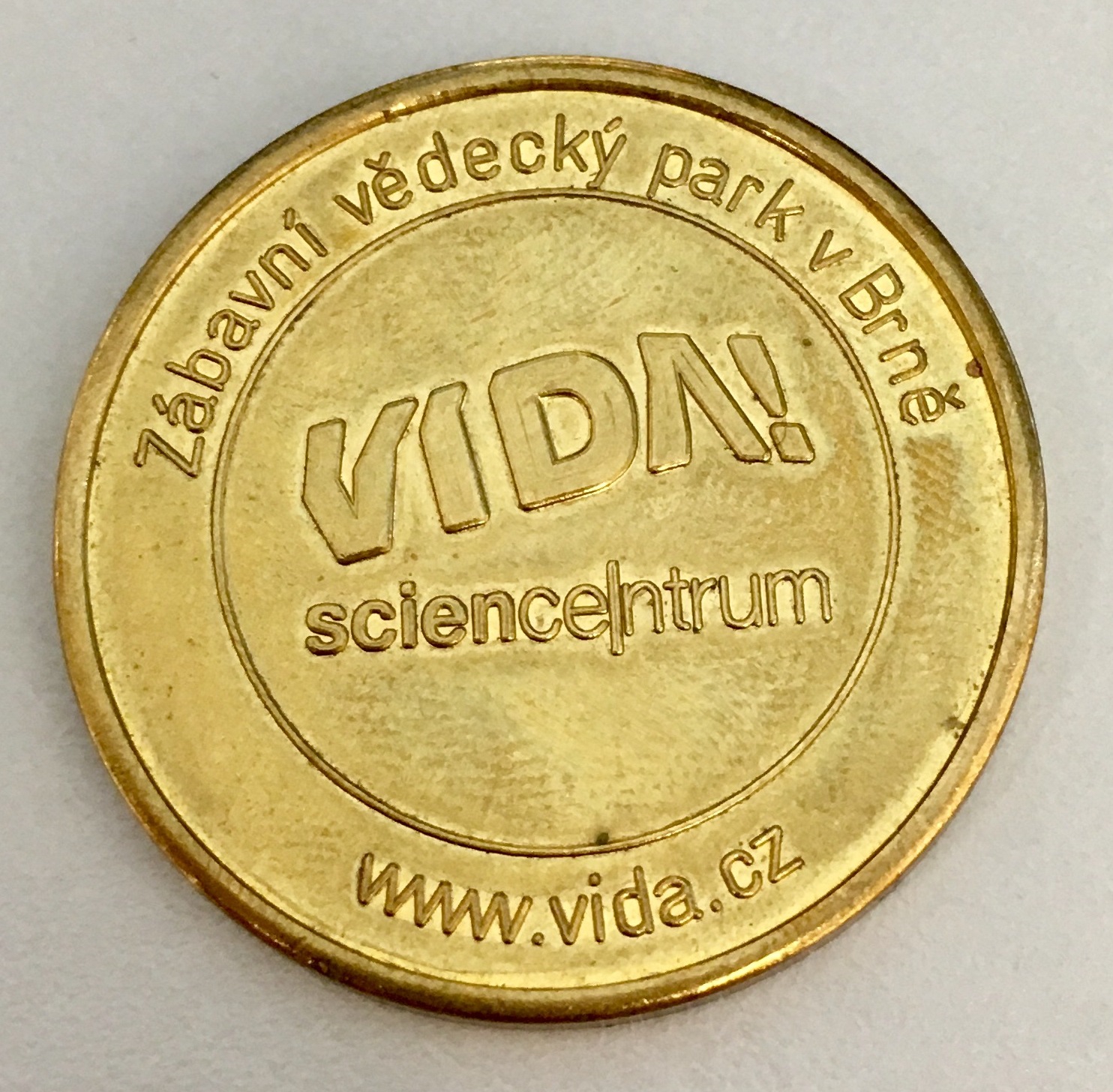Zakázková čokoládová mince pro firmu VIDA
